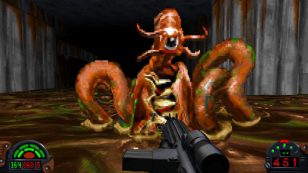 A screenshot of the game Star Wars: Dark Forces. The player is in the sewer, under attack by a dianoga - a creepy monster with one eye, several tentacles, and huge sharp teeth.