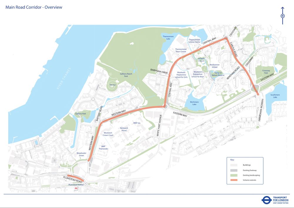 This overview map illustrates the proposed "Main Road Corridor" scheme in Thamesmead, London, adjacent to the River Thames. The highlighted route begins near the junction of Woolwich Road and Plumstead Road, proceeding east along Western Way, then following Central Way (also labelled as Church Manor Way), before curving sharply northeast onto Bartholomew Road and finally connecting back onto Eastern Way. The route delineates a main thoroughfare through the area, passing near significant local amenities such as Thamesmead School and Southmere Lake, with the colour-coding indicating the new Scheme route alongside existing sections of the road network, suggesting substantial road improvements or alterations are planned for this section of the borough.