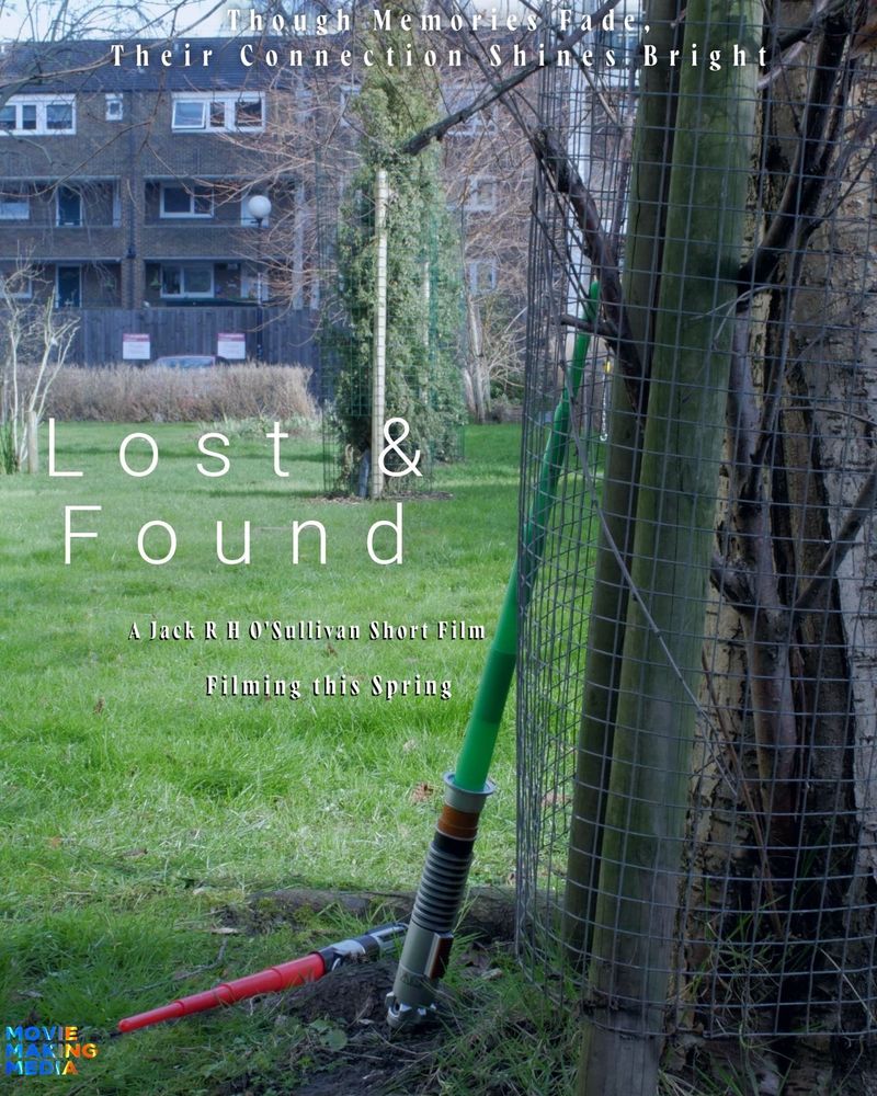 Poster for “LOST AND FOUND”. The poster depicts a green lightsaber propped up against a tree in a London community garden, with a red lightsaber resting on the ground. 