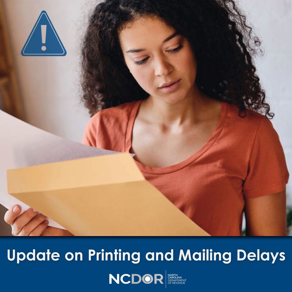 Woman opening mail.

Update on printing and mailing delays.