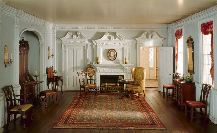 Designed by Narcissa Niblack Thorne
American, 1882-1966, A11: Rhode Island Parlor, c. 1820, Miniature scale model of a large, furnished white-walled room with ornamental moulding, wooden flooring, upholstered wooden chairs, and a large decorative carpet in the floor's center.