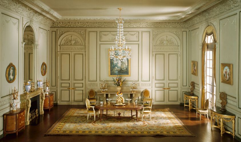 Designed by Narcissa Niblack Thorne
American, 1882-1966, E-23: French Dining Room of the Periods of Louis XV and Louis XIV, Miniature dining room with light gray walls, elaborate decorative molding, gold and glass chandelier, and gold gilt furniture.