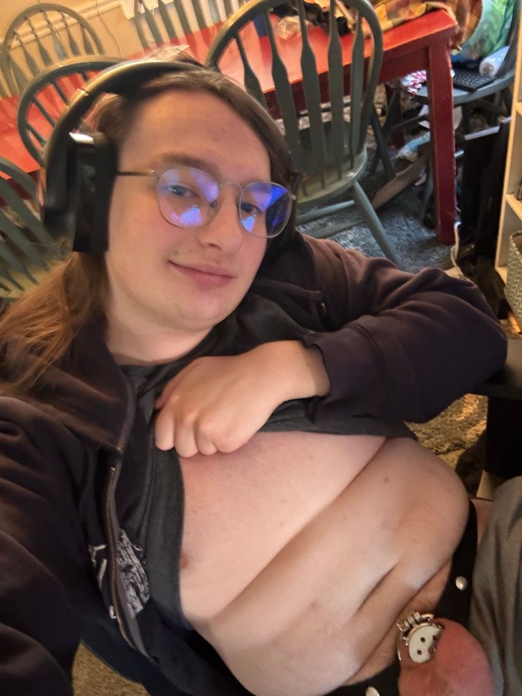 Me showing off my cage and breasts