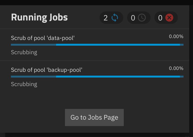 A screenshot of the TrueNAS running jobs UI showing two jobs running, a scrub of backup pool and a scrub of data pool

