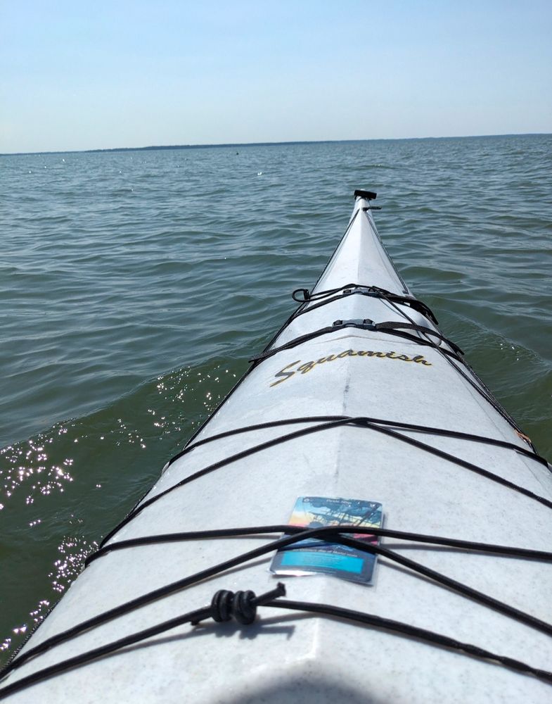 Pirate Ship sorcery card strapped top deck to a kayak 