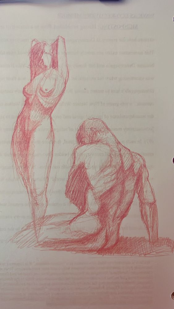Red pencil on scrap paper drawing of two figures male and female 
