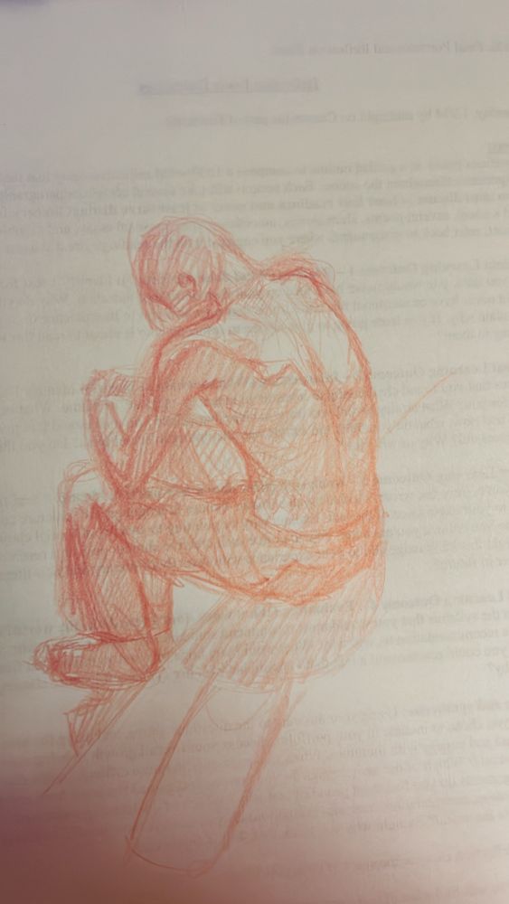 Red pencil on scrap paper drawing of a shirtless man sitting. 