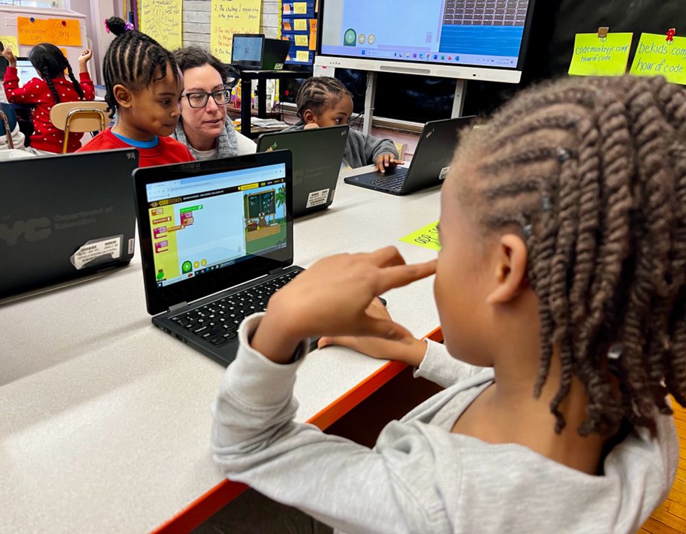 A group of students coding
