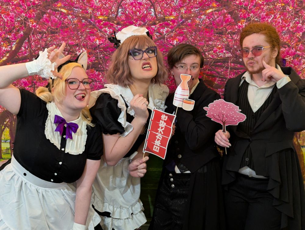 Princess Cakeroll, Nova Auron, Princes Alice & Sheer Madness pose in front of a Sakura tree backdrop with Japanese inspired props