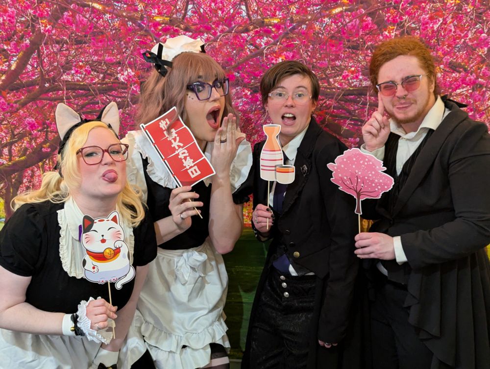 Princess Cakeroll, Nova Auron, Princes Alice & Sheer Madness pose in front of a Sakura tree backdrop with Japanese inspired props