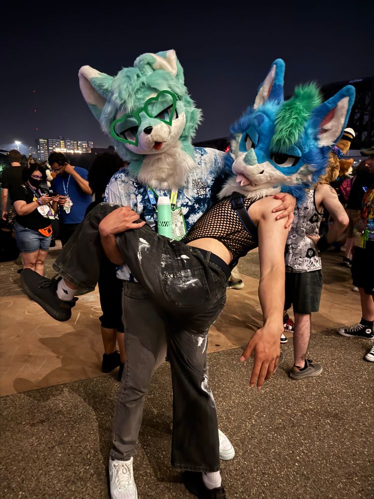 two fursuiters by the AC waterfront