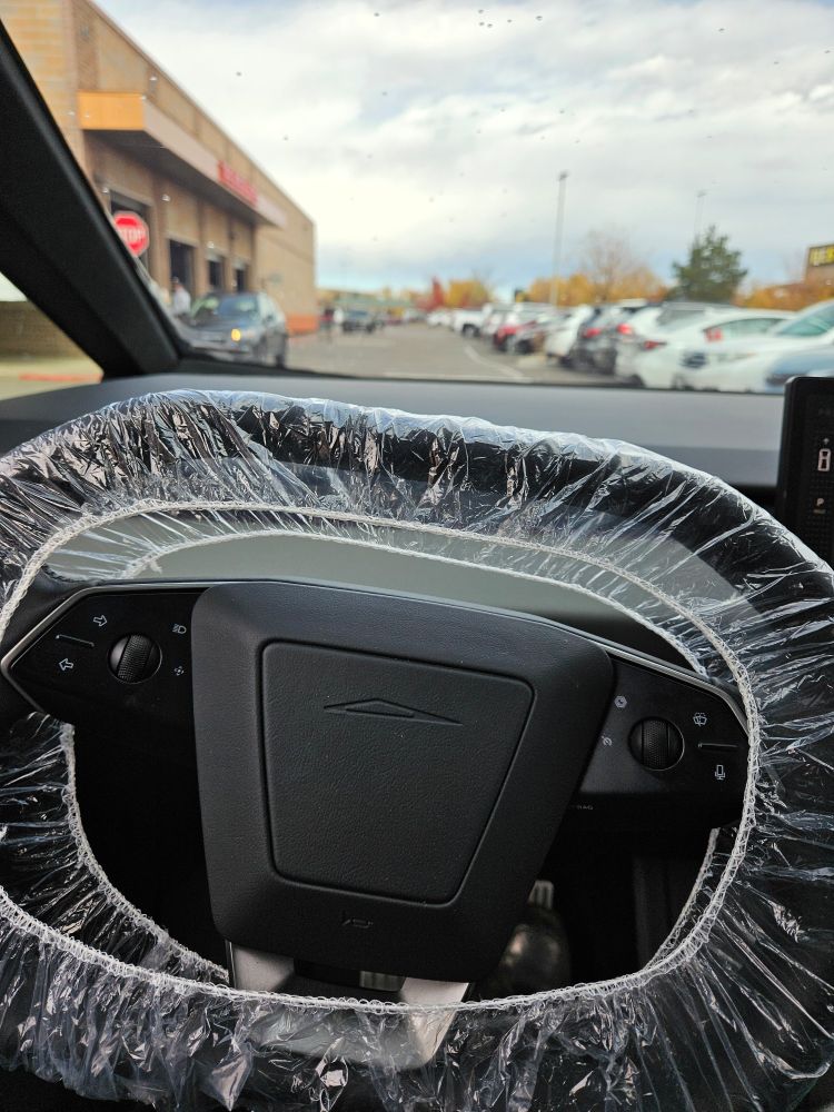 Photo from the drivers seat of a tesla cybertruck