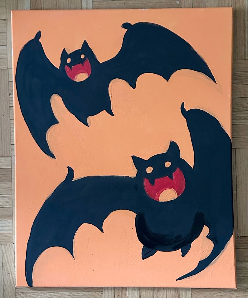 An acrylic painting of two cartoon silhouetted pointy-eared bats flying around. They both have big cheerful fanged smiles, revealing red mouths and orange tongues. They have little orange eyes too! The painting's background is pumpkin orange.