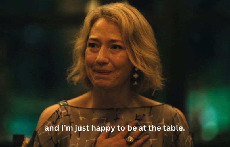Carrie Coon's character from White Lotus saying "and I'm just happy to be at the table." with tears in her eyes