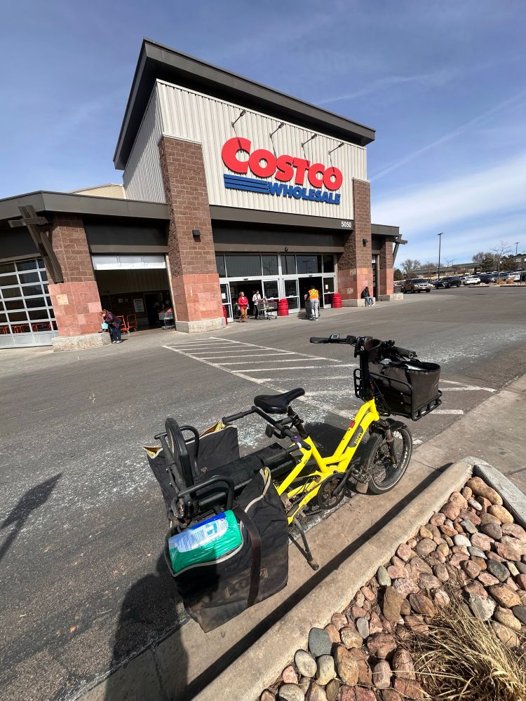 Loaded cargo bike leaving the store