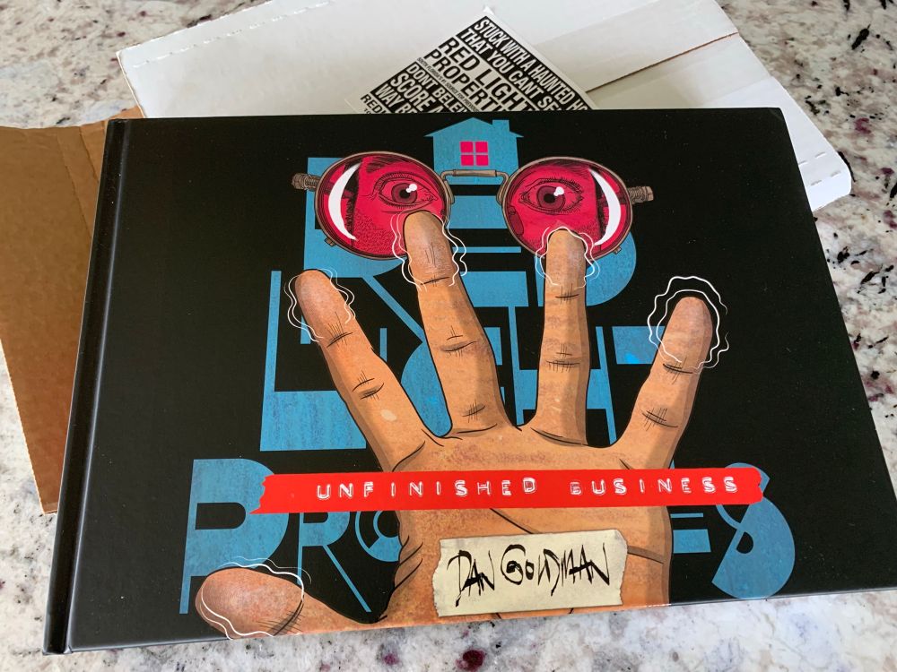 The hardcover of Red Light Properties: Unfinished Business by Dan Goldman. Even the packaging was top-notch. 