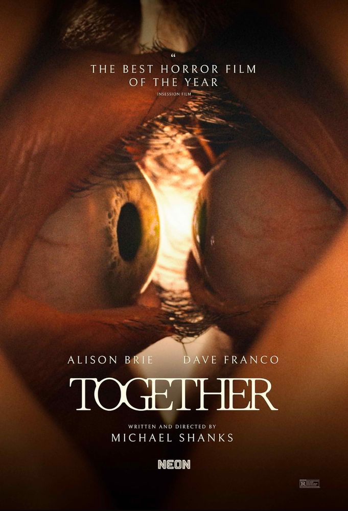 A poster for the movie Together featuring the image of two eyeballs nearly touching with the eyelashes intertwined. 