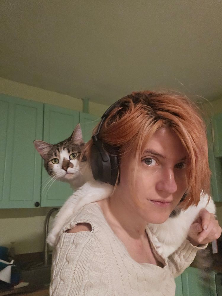 Cat on poster's shoulder 
