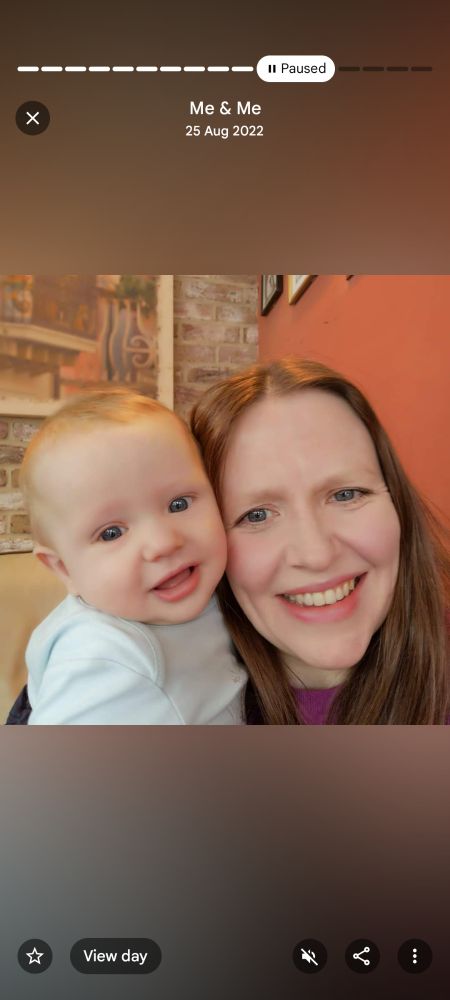 Screenshot from the same Google Photos album 'Me & Me' of a four month old baby with his head next to his mother's. They are both smiling and both have blue eyes but they're quite obviously different people, not least because they're separated by almost 37 years.