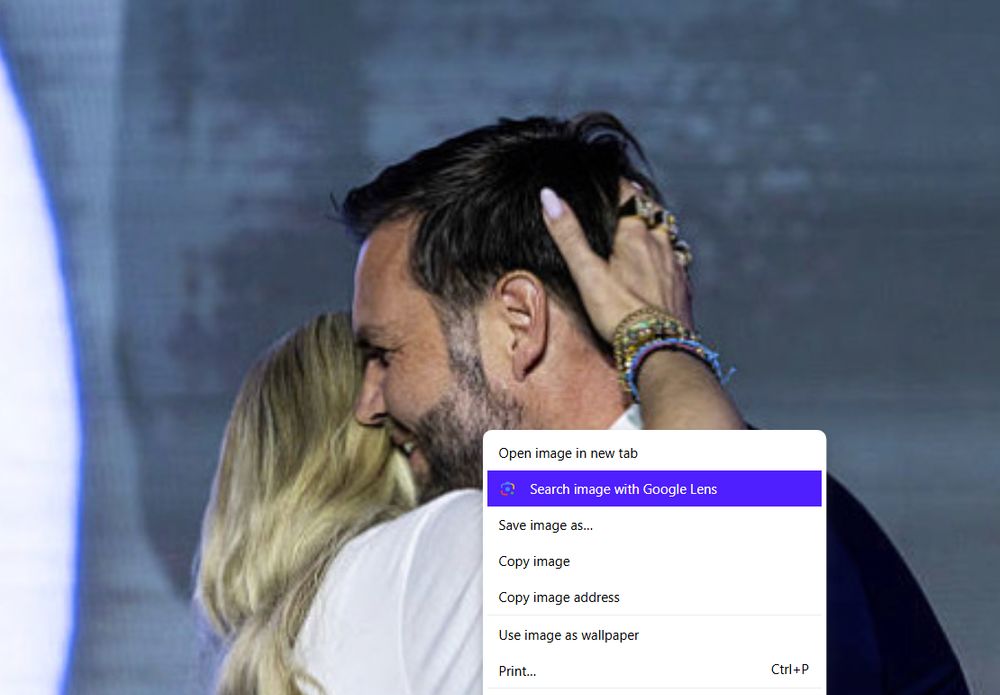 photo shows a menu with "search image with Google Lens" as an option