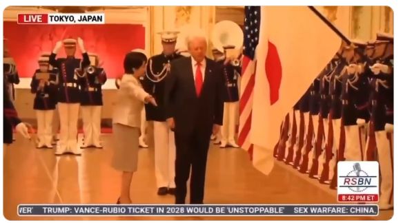 while Japan PM Takaichi is trying to help Trump figure out where to walk, the RSBN chyron on the screen reads "Trump: Vance-Rubio ticket in 2028 would be unstoppable"