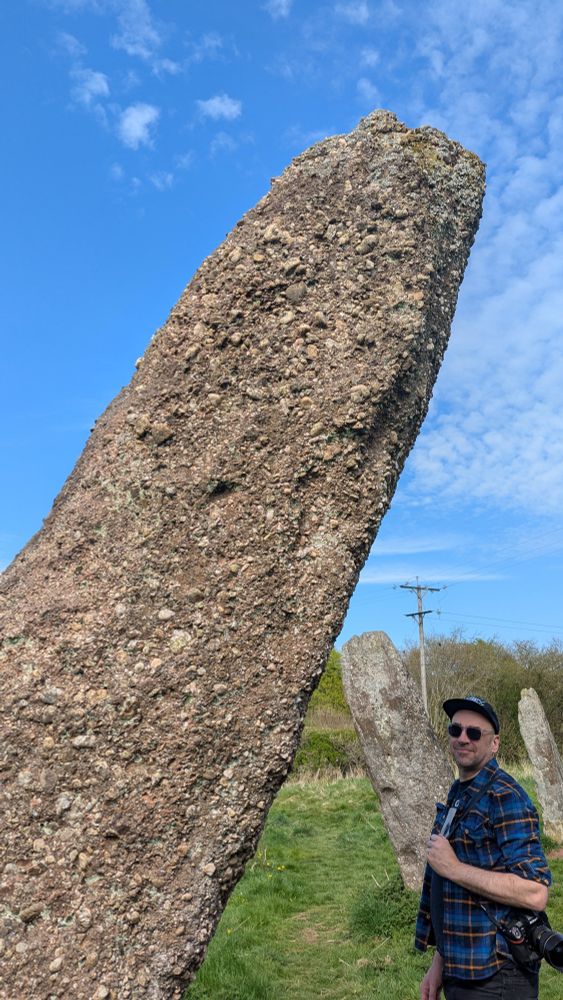 Three standing stones in a line