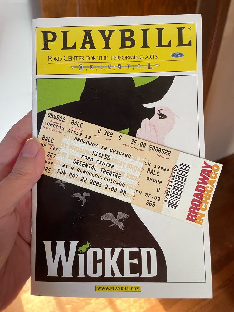A ticket from May 22, 2005 for a Broadway in Chicago performance of Wicked and  copy of the playbill.