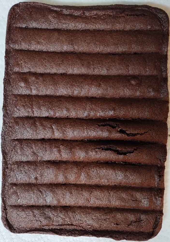 undivided brownie with line imprints that make it look like an air mattress lol