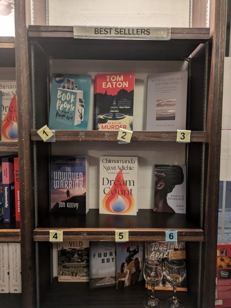 Best selling book display at the Book Lounge, Roeland Street. Jon Keevy's The Unwoven Warrior is at number 4.
