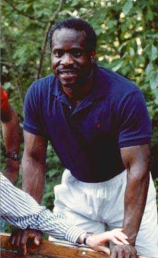 a picture of young Clarence Thomas in a polo shirt looking fucking YOLKED