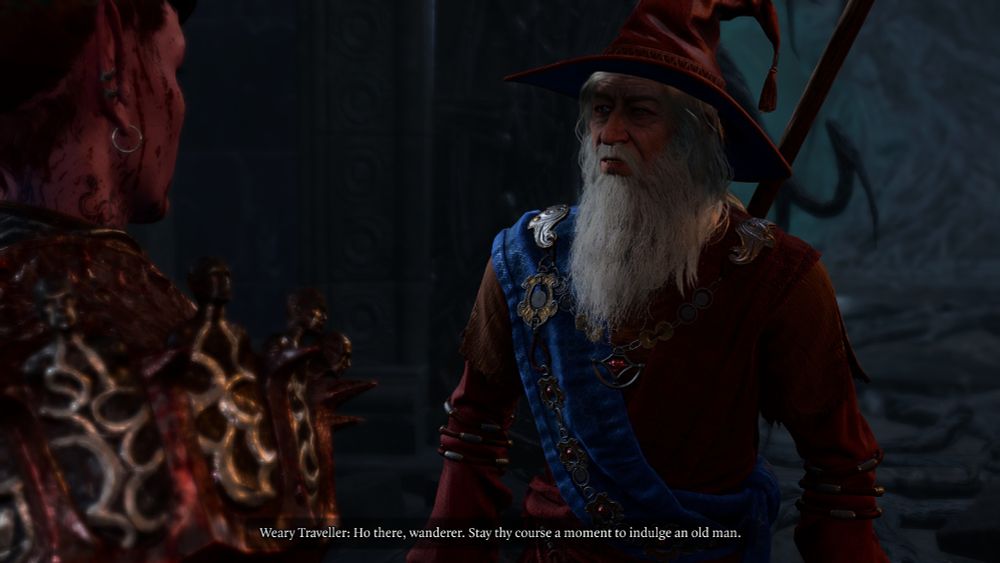 An old white bearded wizard in red robes with a blue sash - the legendary Dungeons and Dragons character Elminster - a screenshot of Baldur's Gate 3 on Steam