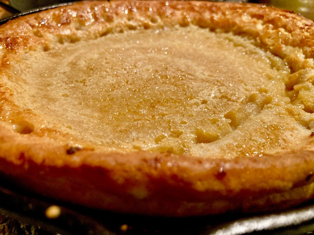 A delicious dutch baby looking pancake 