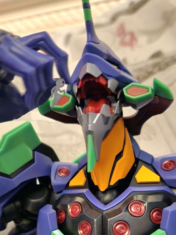 Evangelion Unit 01 holding a small human above her open mouth