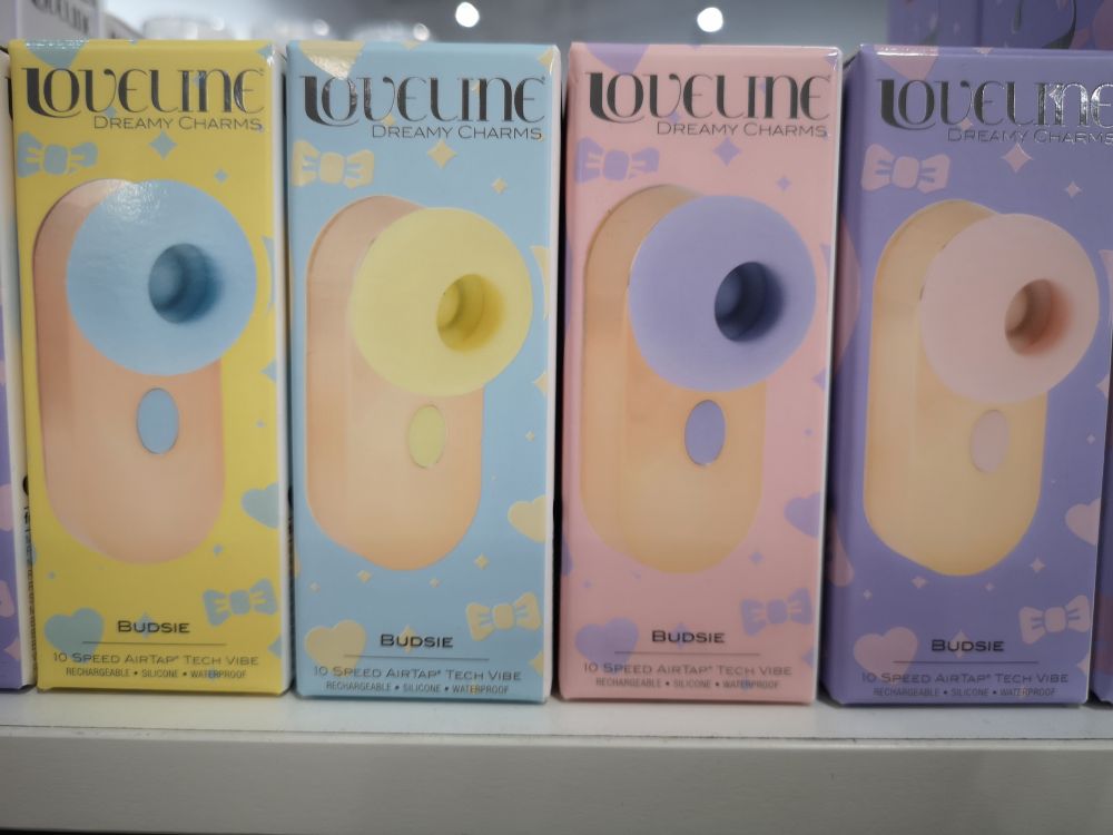 The Loveline Budsie in blue, yellow, lavender, and pink