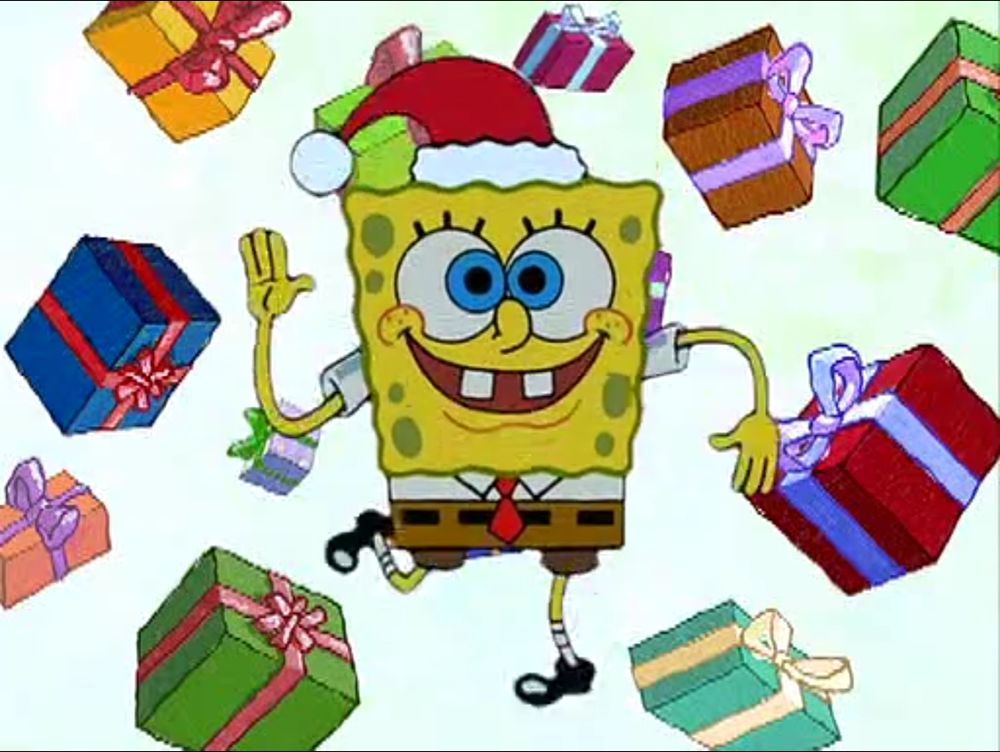 Spongebob Squarepants performing a dance in a Christmas hat with presents behind him