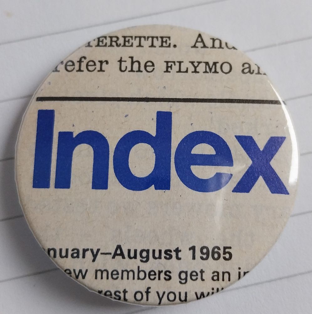 Circular badge with off white background and Index in blue, from the index to January to August Which? magazine 1965.