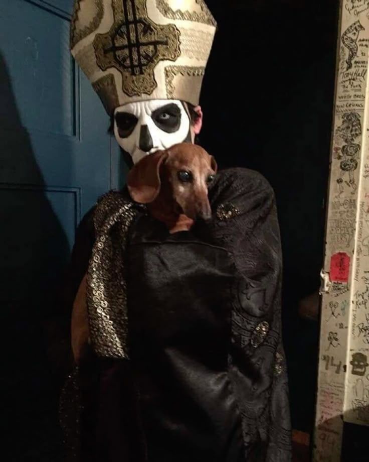 Terzo with a dachshund.