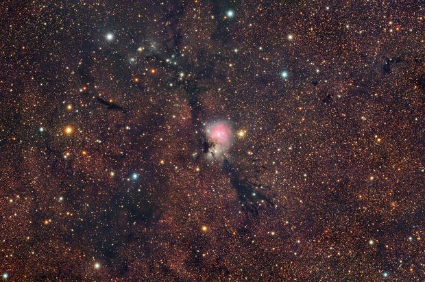 An image of stars and cosmic nebulae.