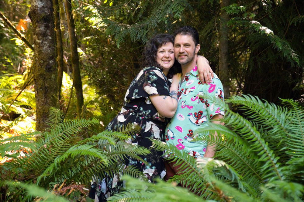 Luci Ferocious and Hades Flambe in a mossy forest
