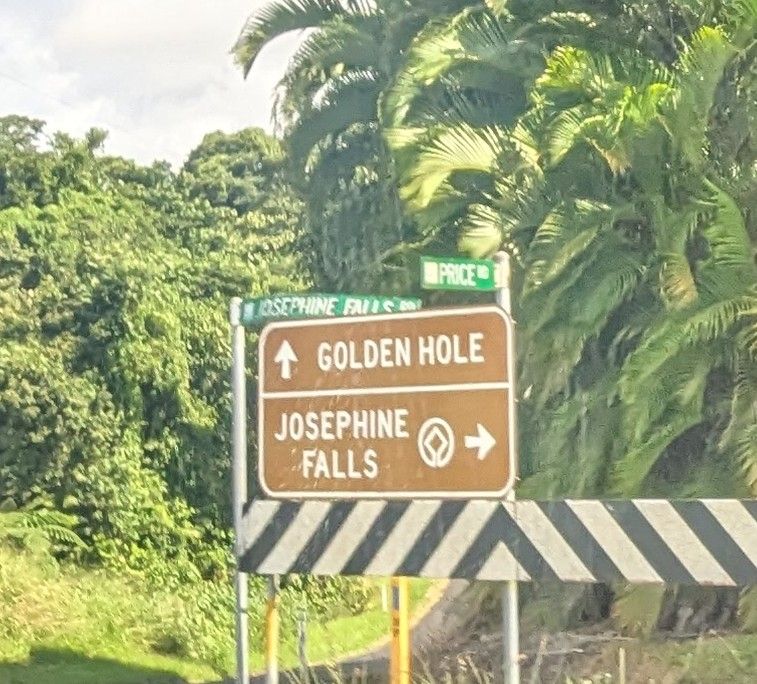 Sign that says "Golden Hole" 