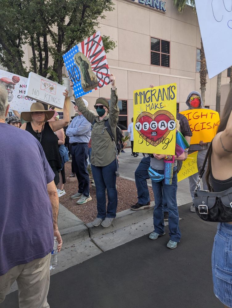 Protest sign says immigrants make Vegas strong