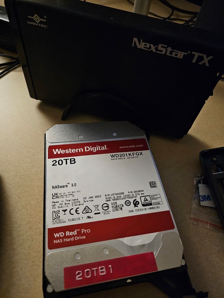 20TB WD Red Pro about to be placed into a Vantec NexStar TX hard drive enclosure.