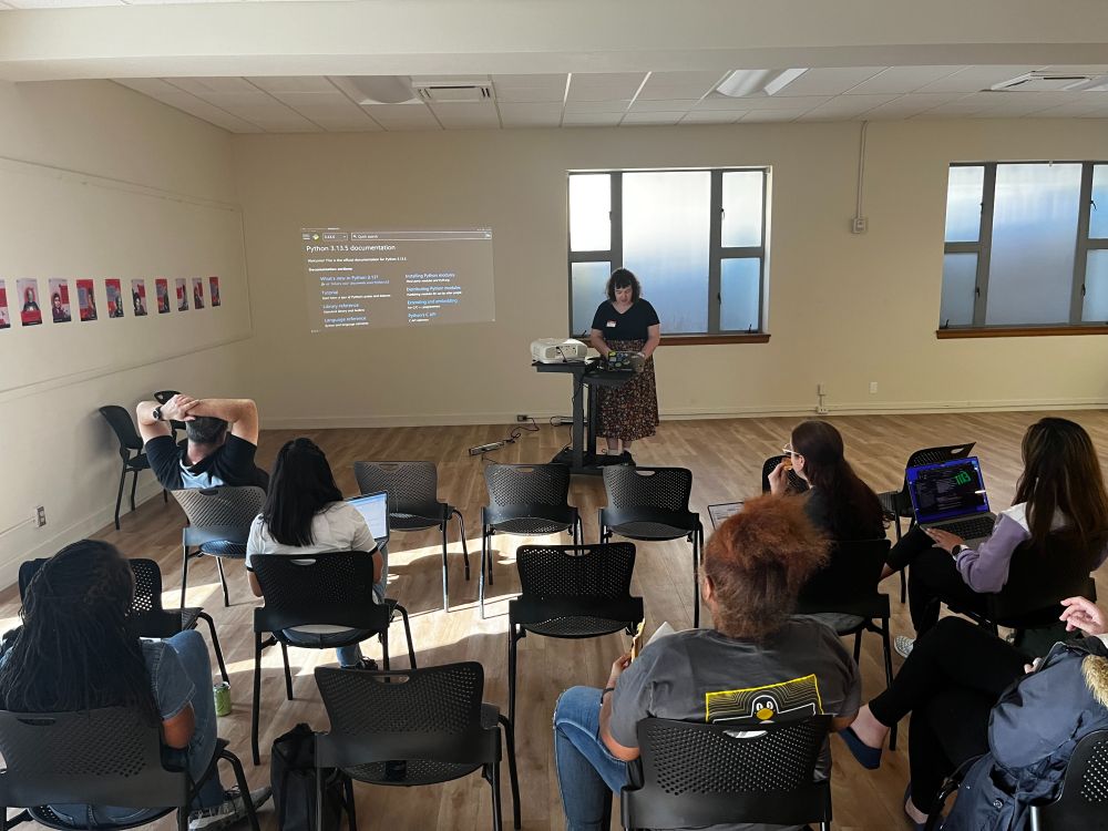 People watching a technical talk 