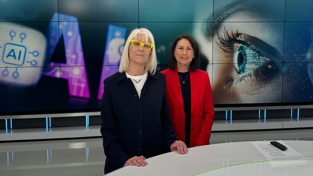 Renee Sieber poses for a photo with Debra Arbec at the CBC Montreal studio.