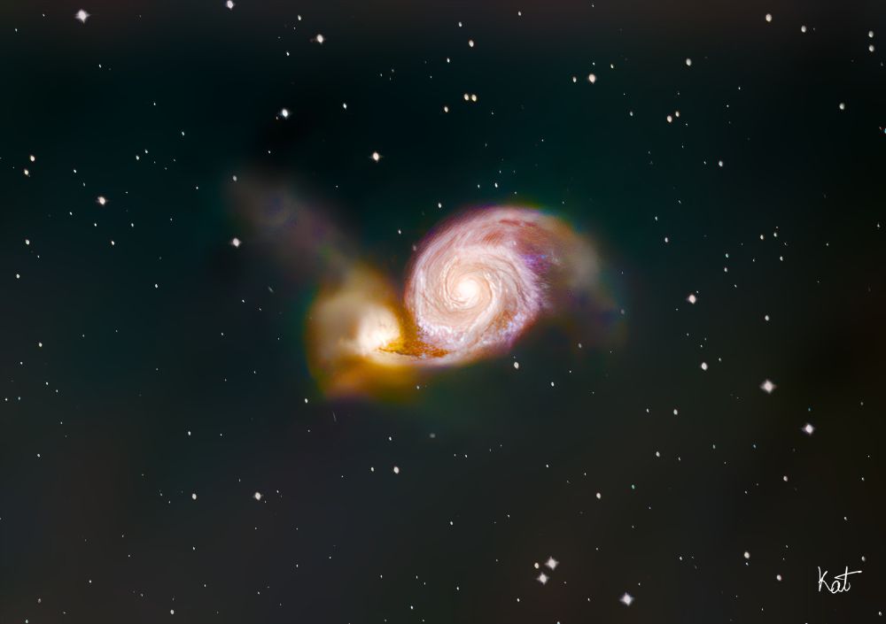 A deep-space image of two interacting galaxies. The smaller galaxy, M51B, appears #jagged and warped as it’s being pulled toward the larger spiral galaxy, M51A, against a backdrop of countless stars.