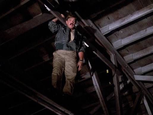 Bruce McGill in Macgyver, circa 1987. He has a huge mustache and sexy forearms 