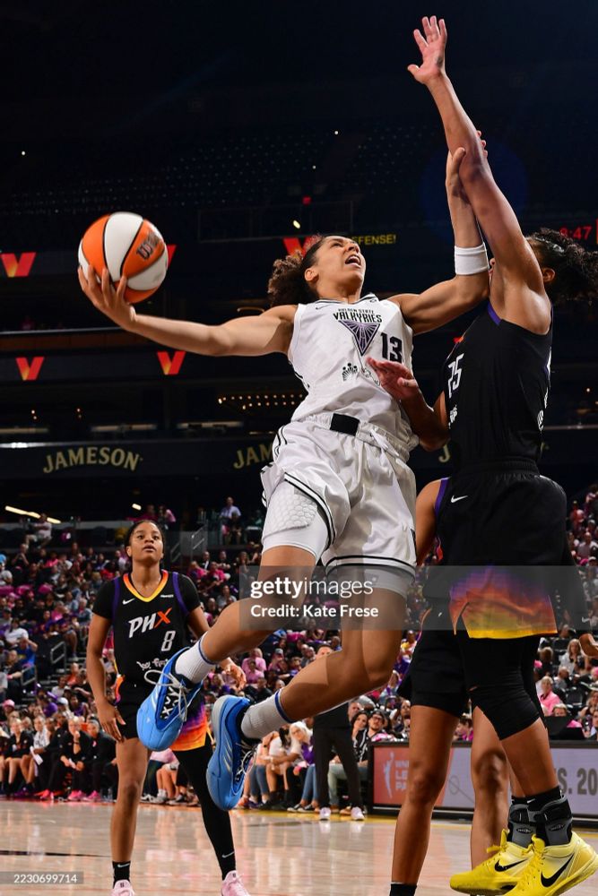 Janelle Salaün of the Golden State Valkyries being defended by Alyssa Thomas of the Phoenix Mercury 