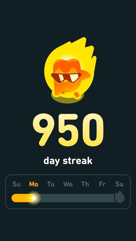 A flaming owl in sunglasses celebrating the 950 day streak I reached on Monday. Today I ran out of streak freezes and also patience with Duolingo's shortcomings 