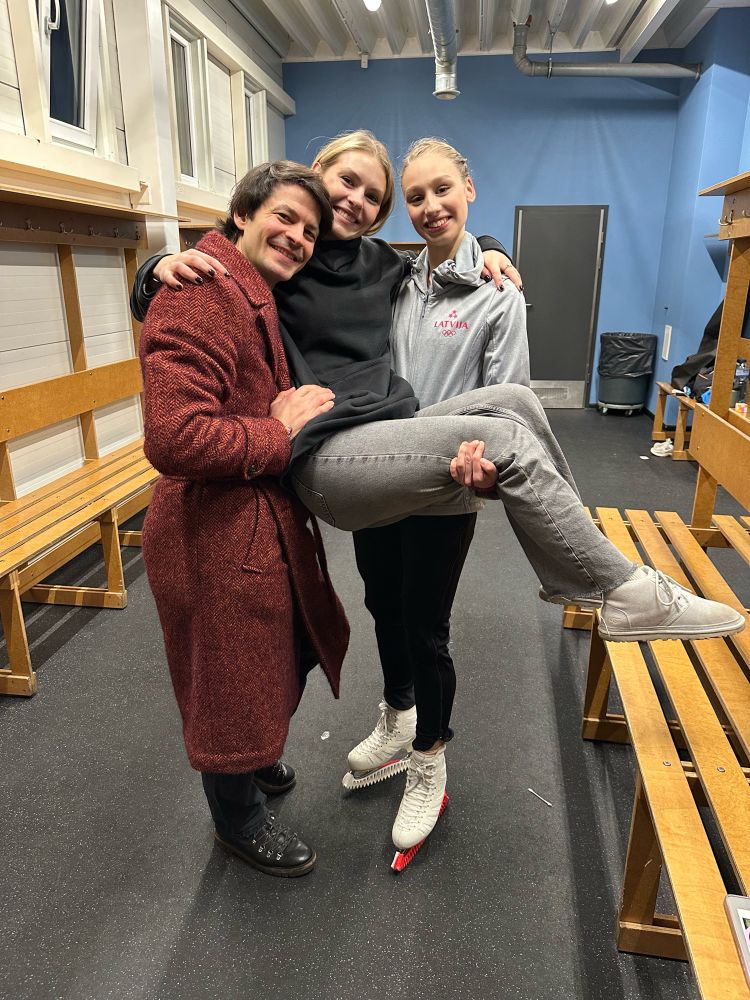 Stéphane Lambiel, Angelina Kuchvalska and Sofja Stepcenko pose together 