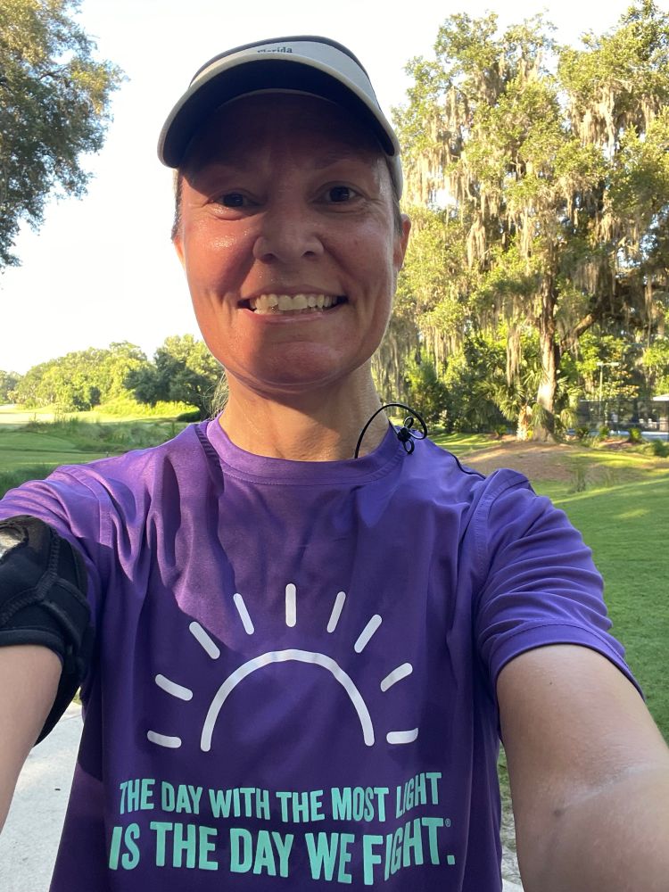 Me, sweaty and smiling, wearing my purple Alzheimer’s shirt that reads The day with the most light is the day we fight. I had just finished my run on Saturday. 